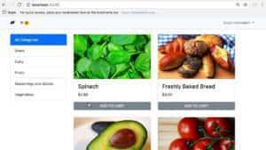 progressive Robot grocery web app page with category list and product cards for spinach and freshly baked bread with Add to Cart buttons