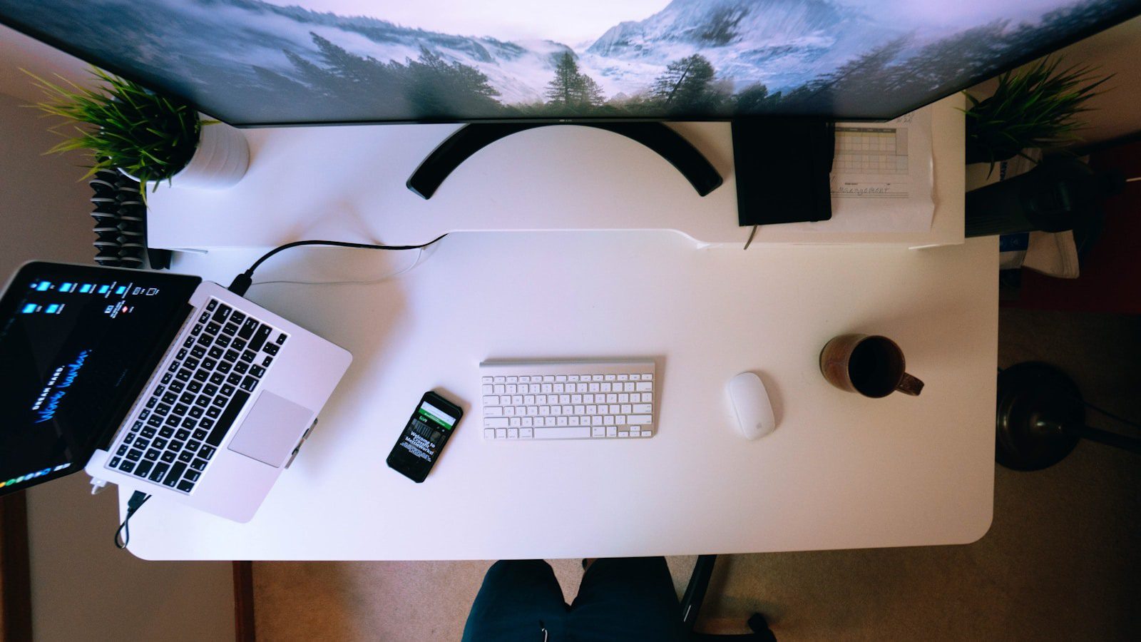9 Best AI-native IDEs for Smarter Coding in 2026 19 Laptop and desktop workspace used to review AI-native IDEs questions