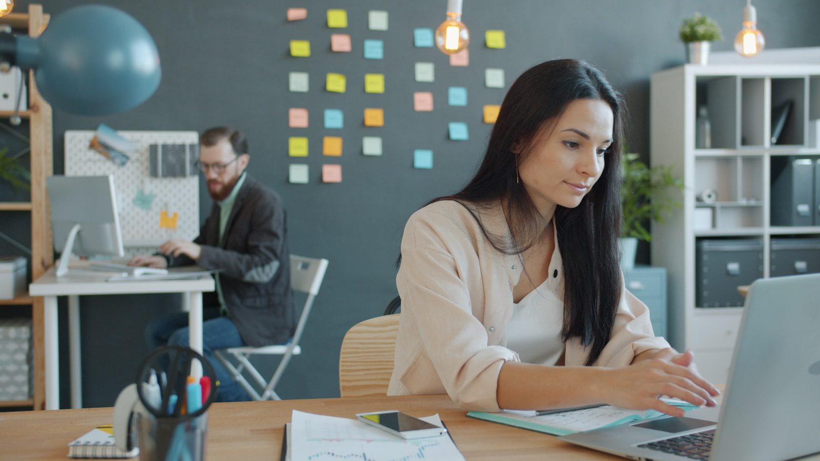 AI ROI Gap: 7 Proven Ways to Turn Pilots Into Profit 23 professional reviewing AI ROI gap questions on a laptop in an office