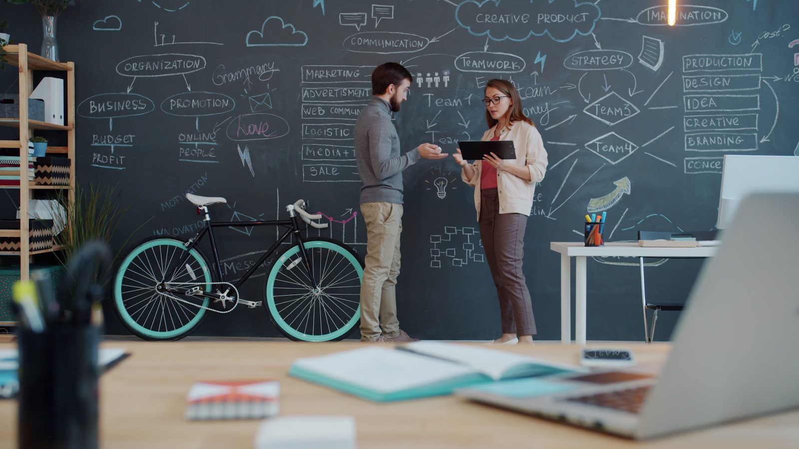 AI ROI Gap: 7 Proven Ways to Turn Pilots Into Profit 18 team redesigning workflows on a chalkboard to close the AI ROI gap
