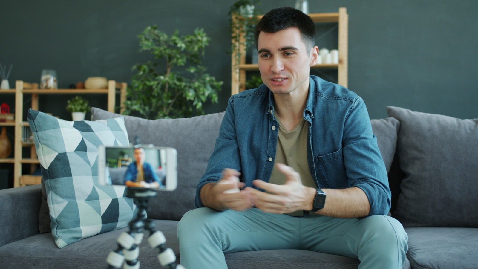 HitPaw AI Marvels: 7 Smart Ways Creators Win 12 Creator recording video on a phone for AI photo and video content