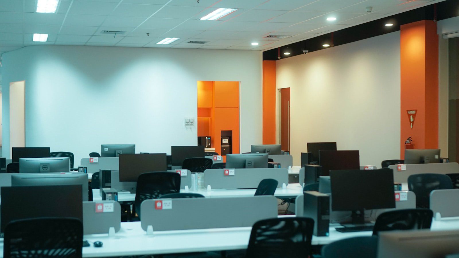 Office computer room representing privacy risks from professional identity and browser telemetry