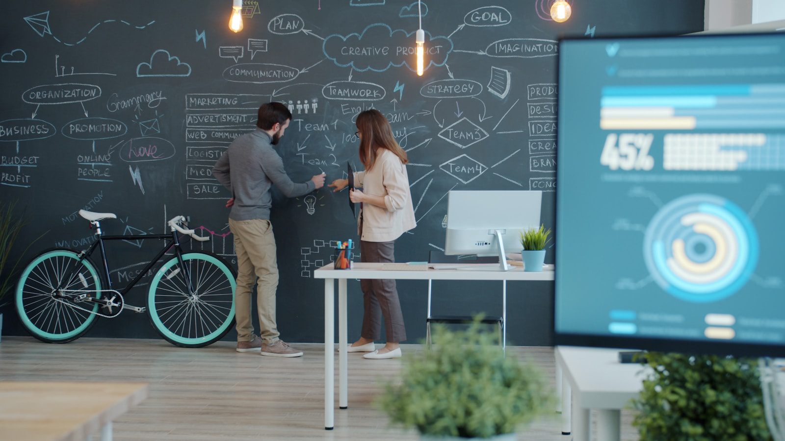 Mendix vs. OutSystems: 7 Powerful Agentic Low-Code Wins 21 Colleagues collaborating on a decision board for agentic low-code platform selection