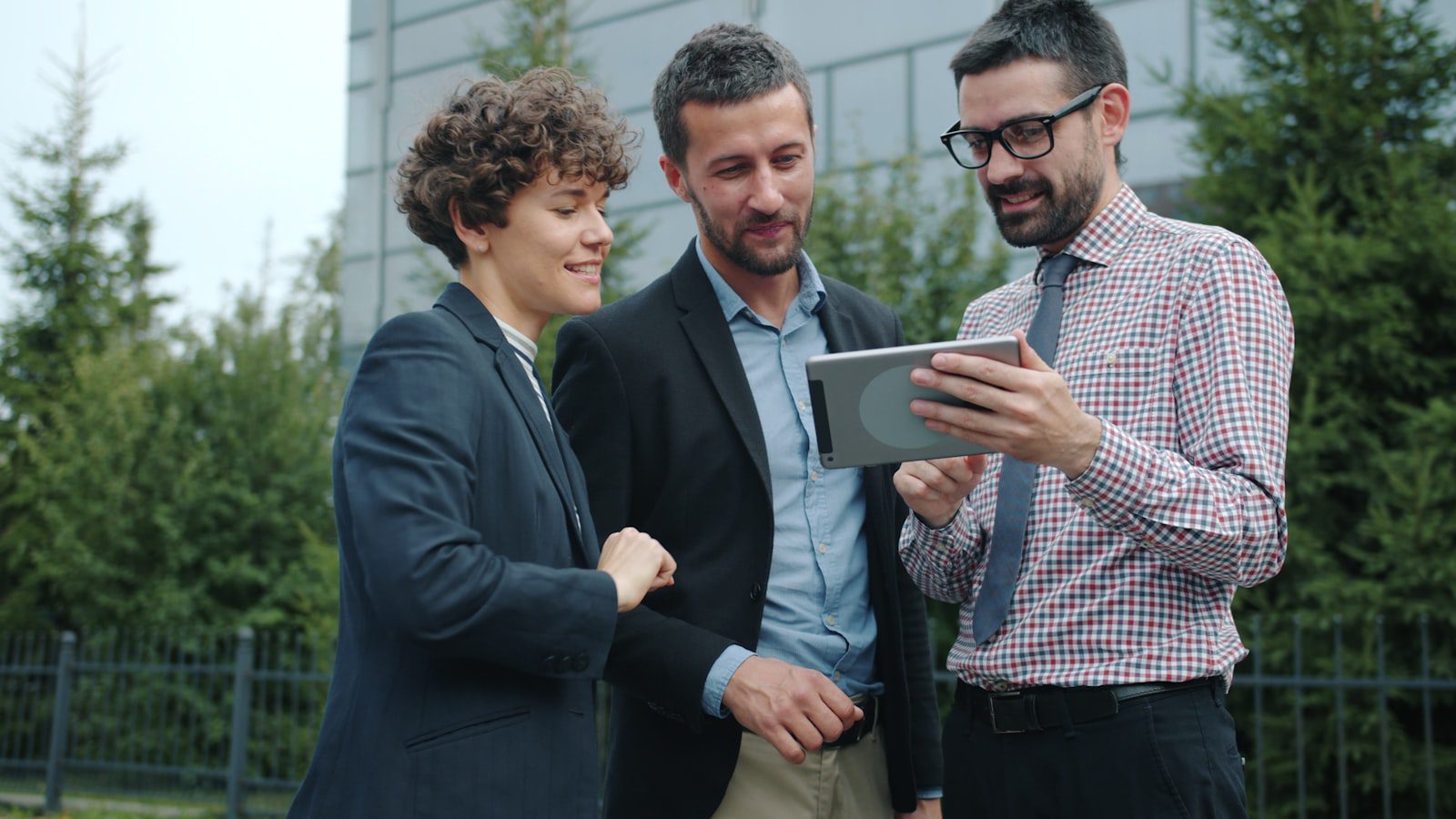 Specialized AI Models: 7 Powerful Advantages 25 team discussing specialized AI models FAQ on a tablet