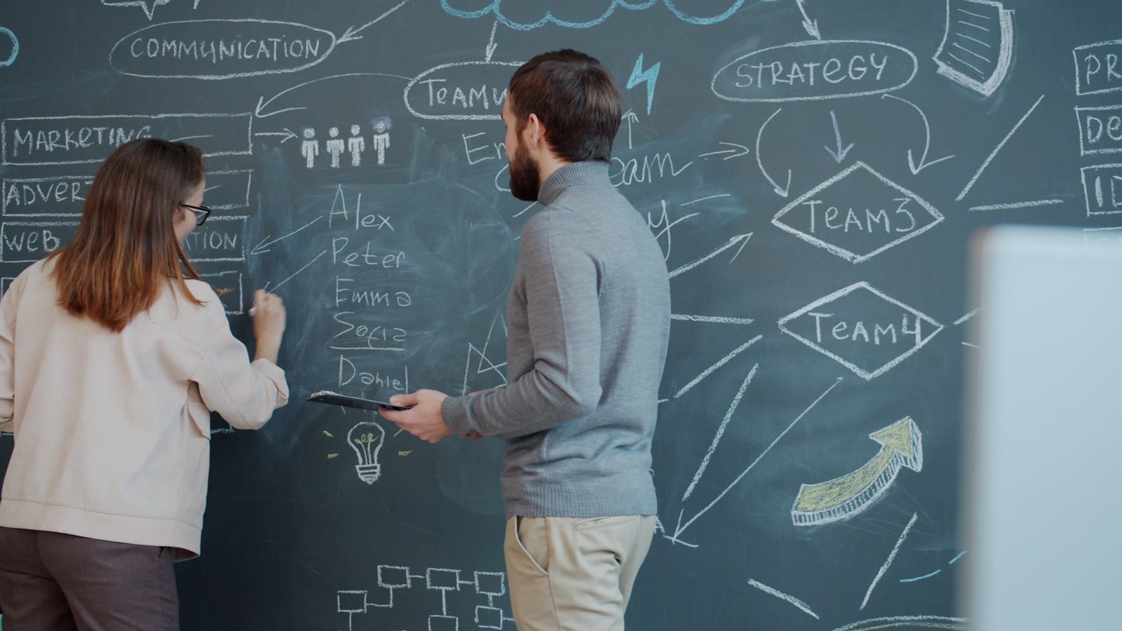 Team9 AI workspace overview represented by people planning agent workflows on a board