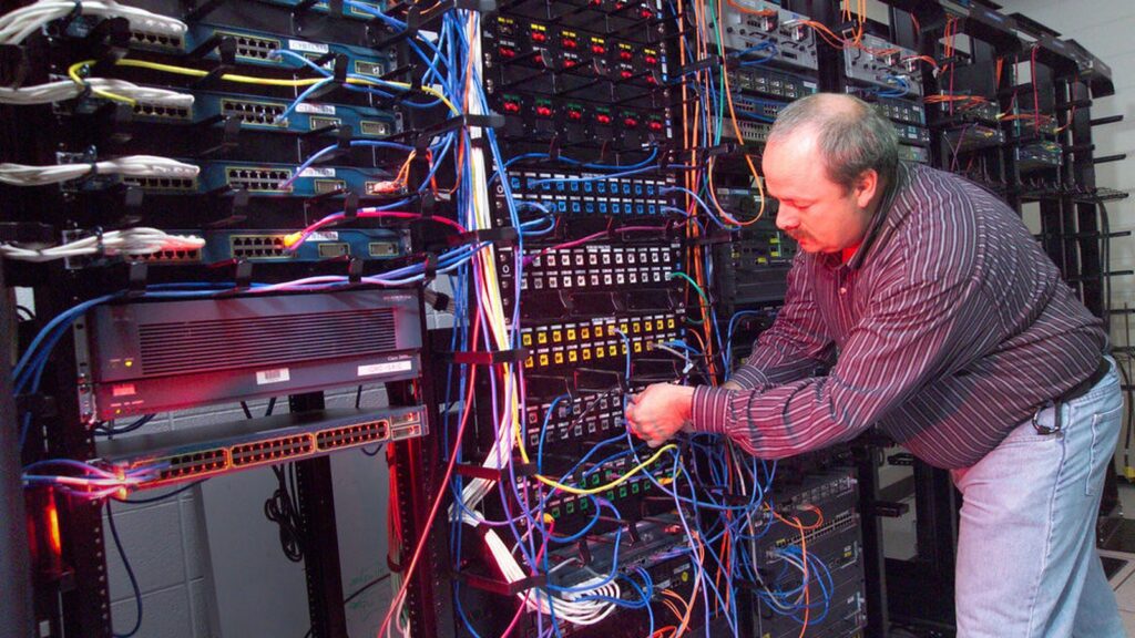 Anthropic Agent Lock-In control plane represented by supercomputing server room infrastructure