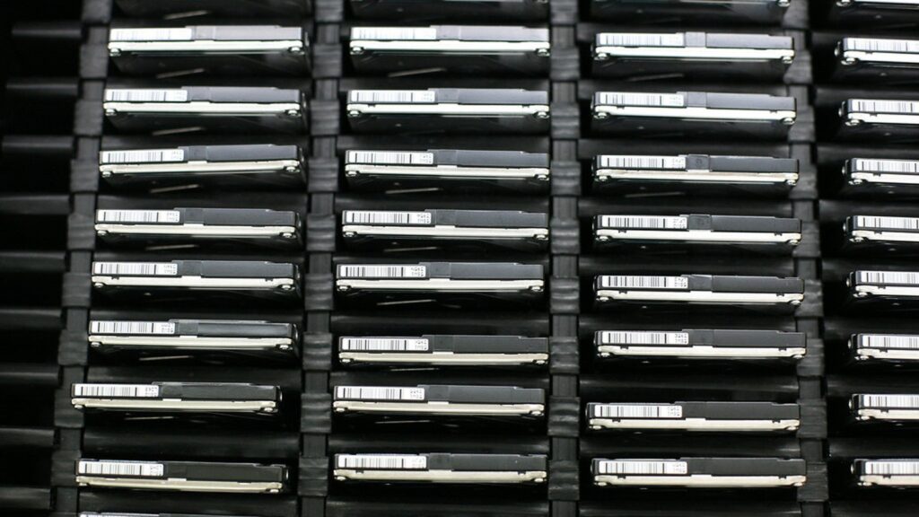 Anthropic Agent Lock-In memory layer illustrated by physical data storage drives