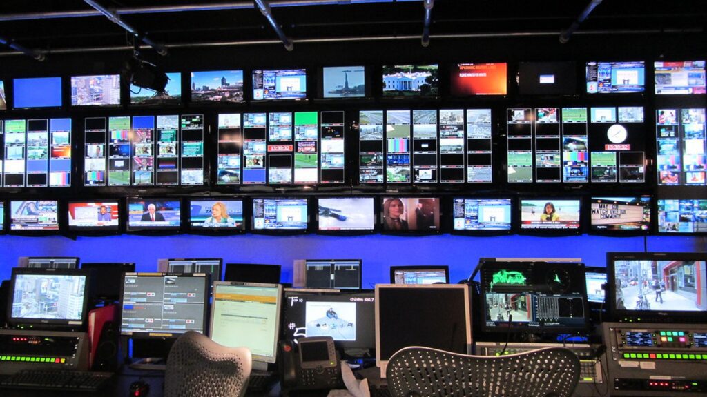 Anthropic Agent Lock-In orchestration risk illustrated by a control room with monitoring screens