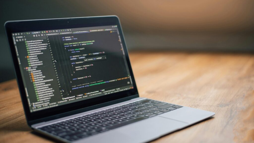 Chrome AI Privacy local model processing shown with software code on a laptop