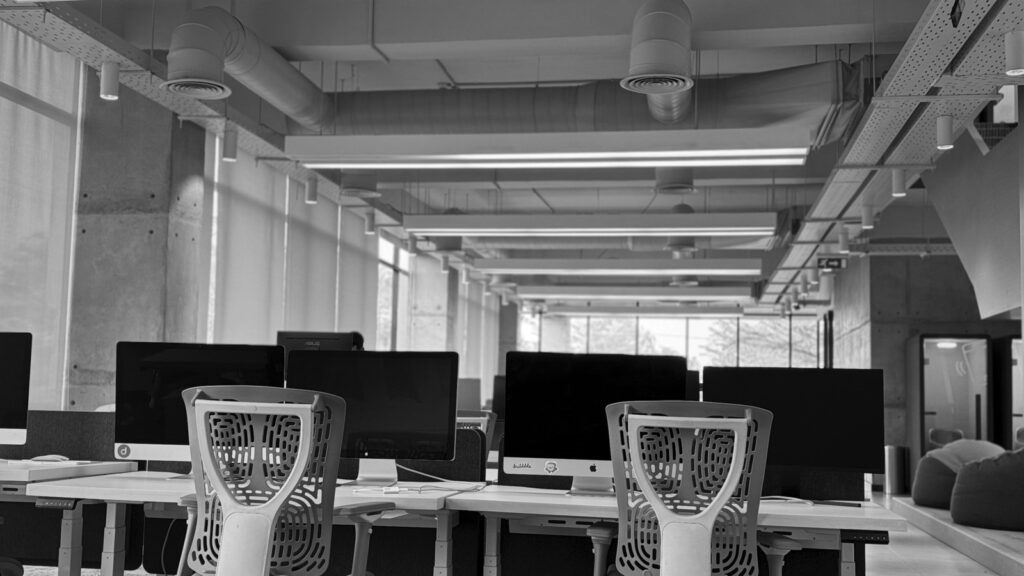 GPT-5.5 Costs shown by office workstations where better AI spreads across more teams