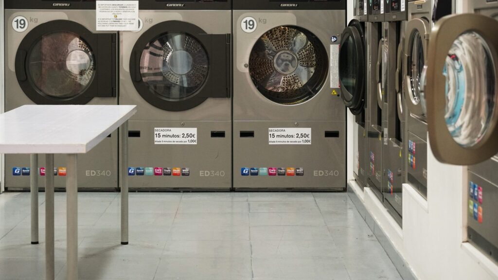 GPT-5.5 Costs shown by industrial machines with visible price labels as a reminder to meter AI runs