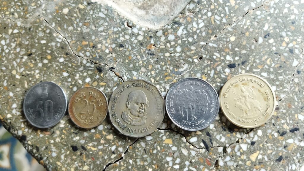 GPT-5.5 Costs shown by a row of coins representing the cash impact of frontier AI adoption