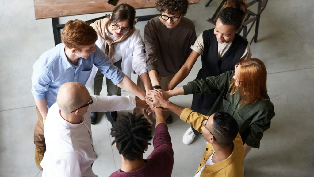 GPT-5.5 Instant governance represented by a team aligning on rollout controls and testing