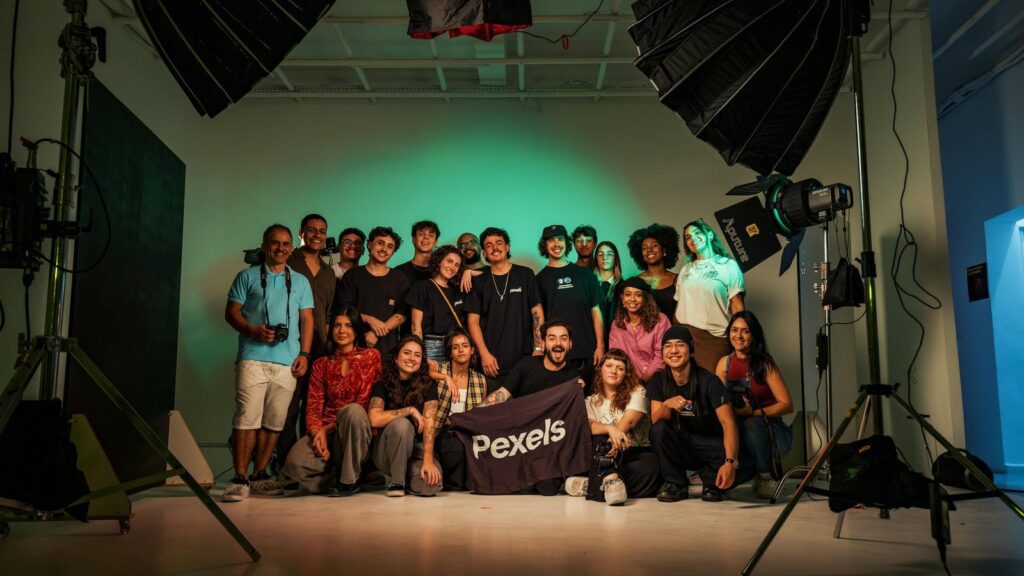 GeniLoop article at-a-glance section represented by a creative team in a professional studio.