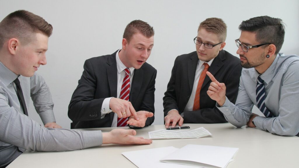 HitPaw Photo Restoration governance checklist represented by a business meeting and document review.