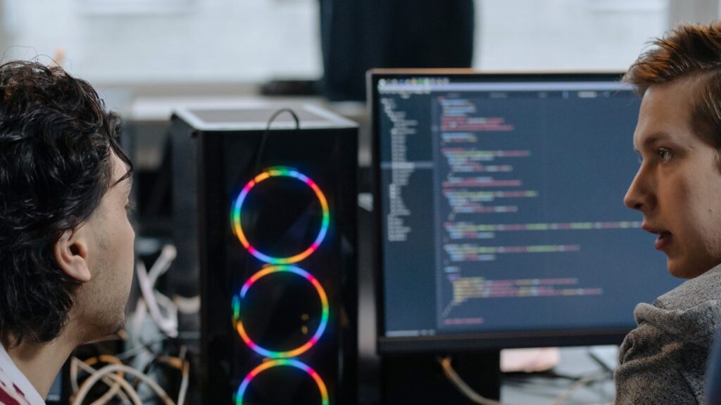 Intent-Based Chaos Testing experiments with developers reviewing computer workflows