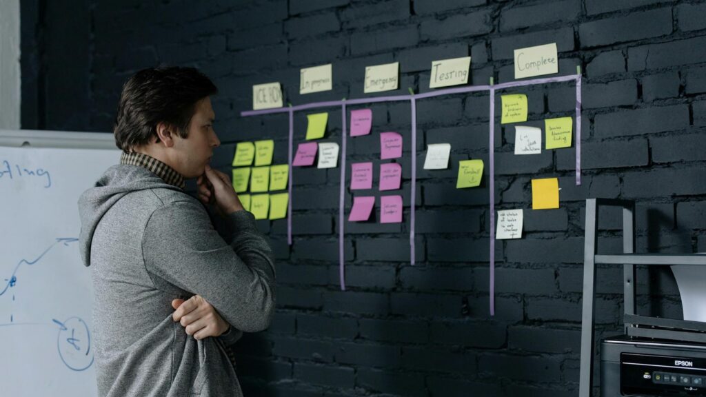 Power Automate vs Zapier governance planning with sticky notes and automation controls