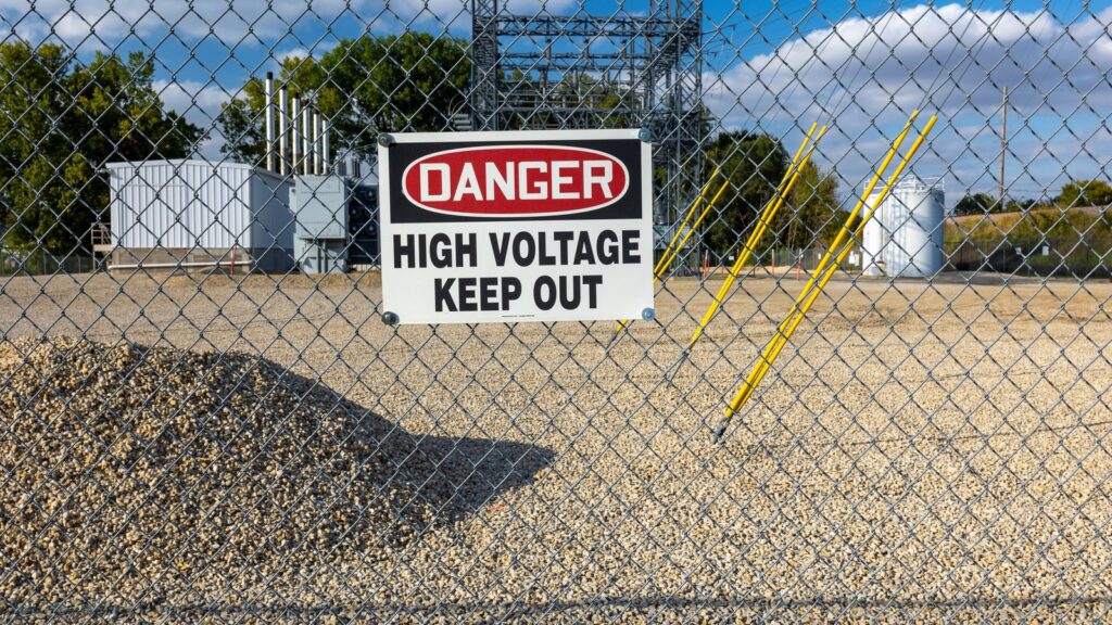 Power-Independent Infrastructure planning shown by power substation behind a safety fence