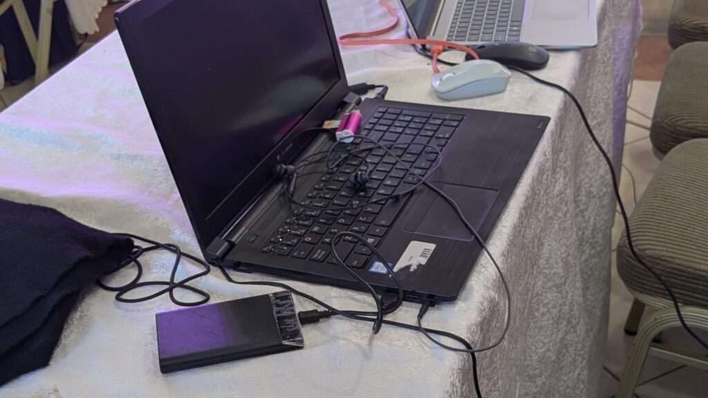 Power-Independent Infrastructure local battery workstation setup with laptops and cables