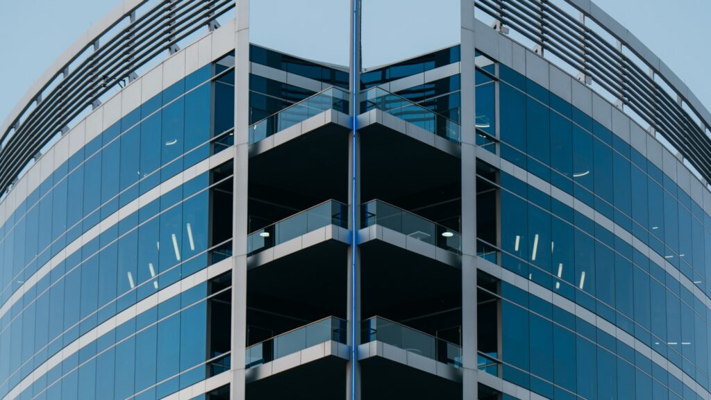 Predictable Budgeting shown by a modern office building for supplier accountability