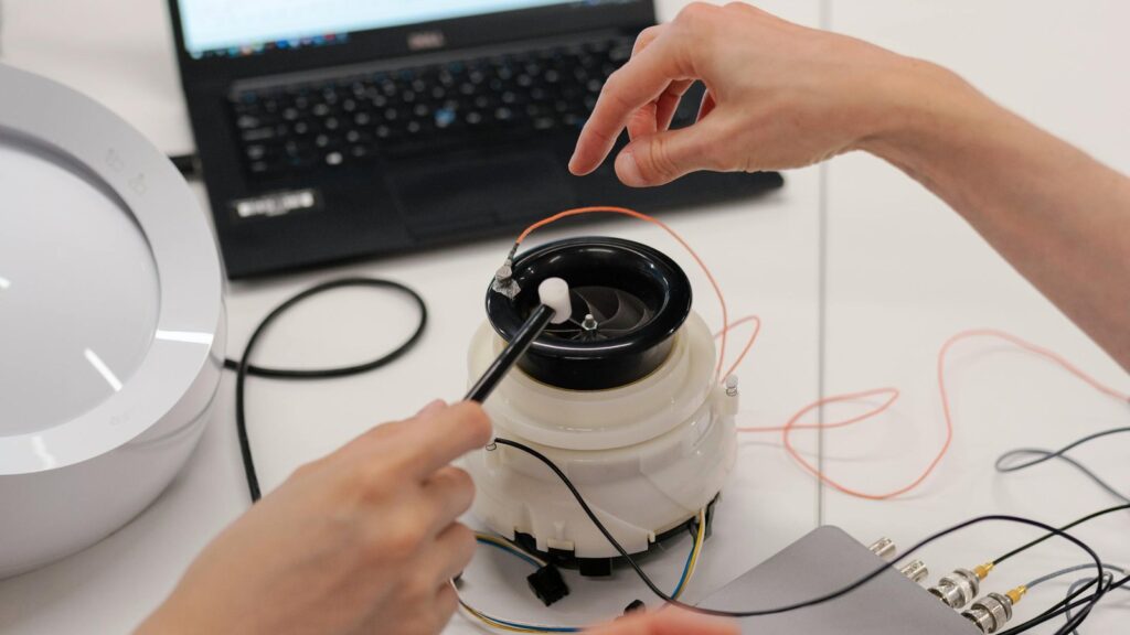 Seed3D 2.0 governance represented by engineers testing a product and reviewing production controls