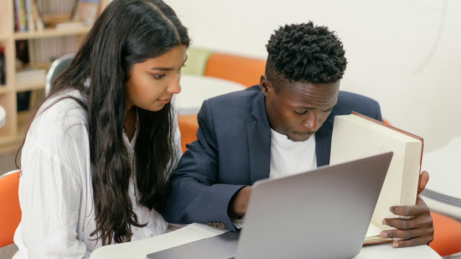 AI Video Translator Review: 7 Smart Localization Wins 19 AI Video Translator FAQ with a teacher and student reviewing multilingual learning materials