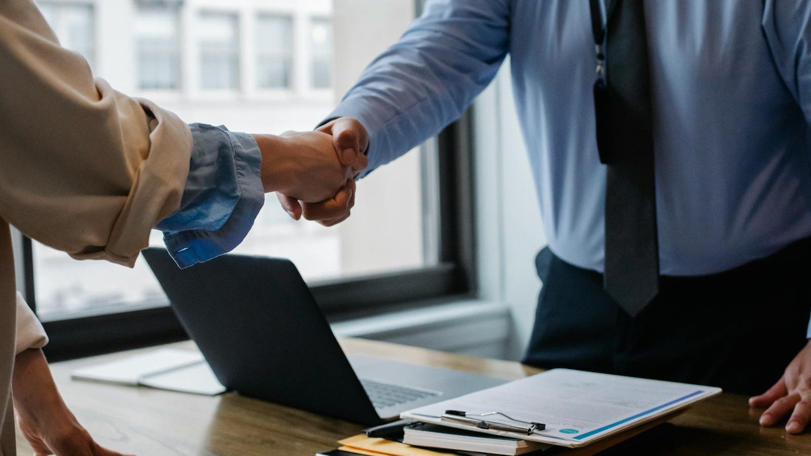 asynchronous collaboration tools: team coordinating tasks through chat and dashboards.