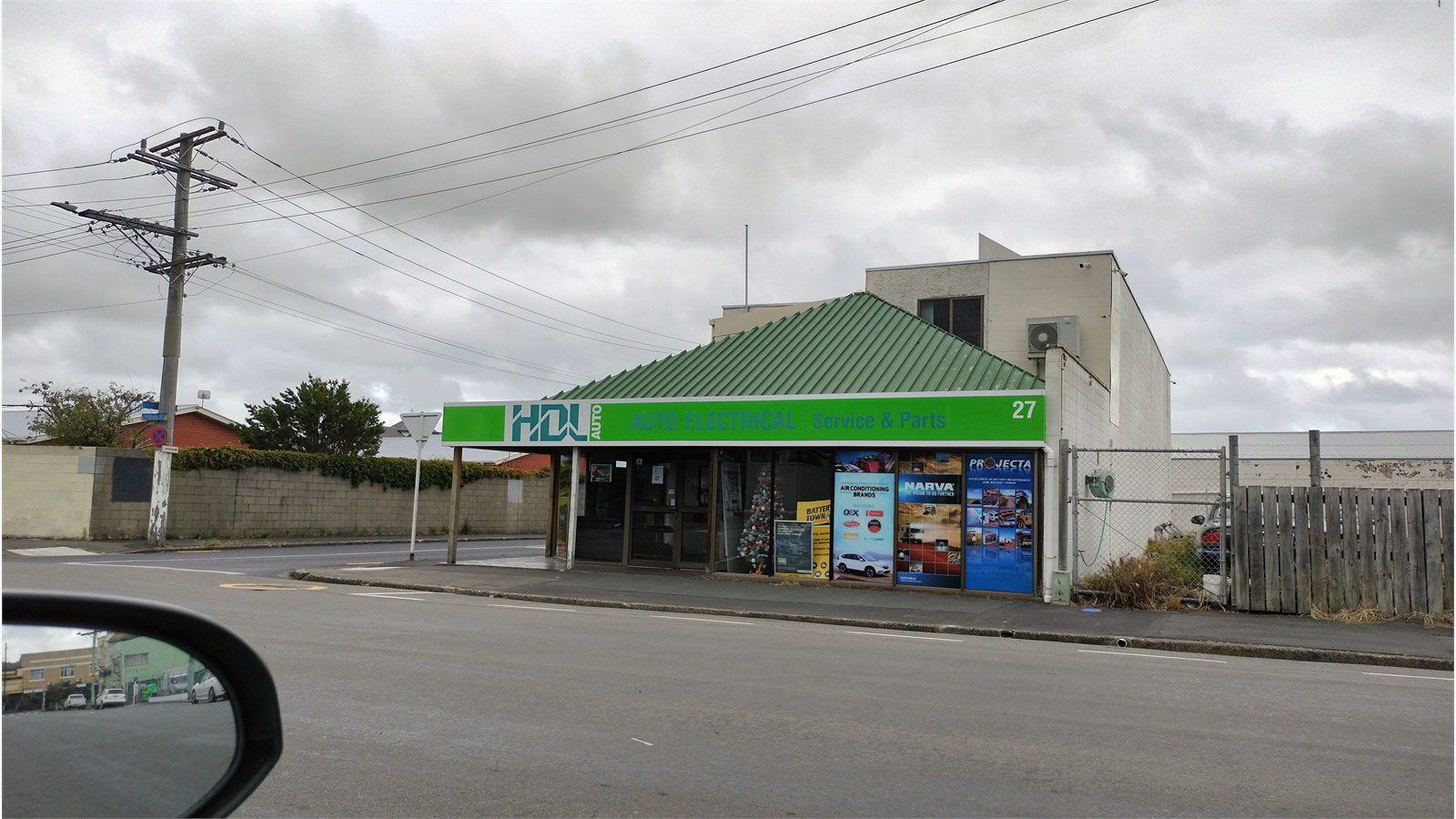 Cloud-Based Inventory Tracking: 7 Smart Auto Shop Setups 18 auto repair business exterior representing secure access controls for supplier data and customer records