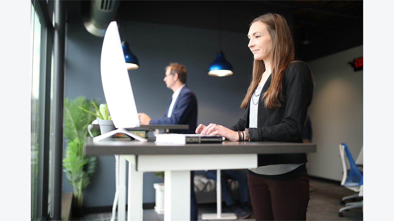 Customer Service Tech Upgrades: 9 Simple Wins 22 office worker at a computer reviewing a simple customer service dashboard