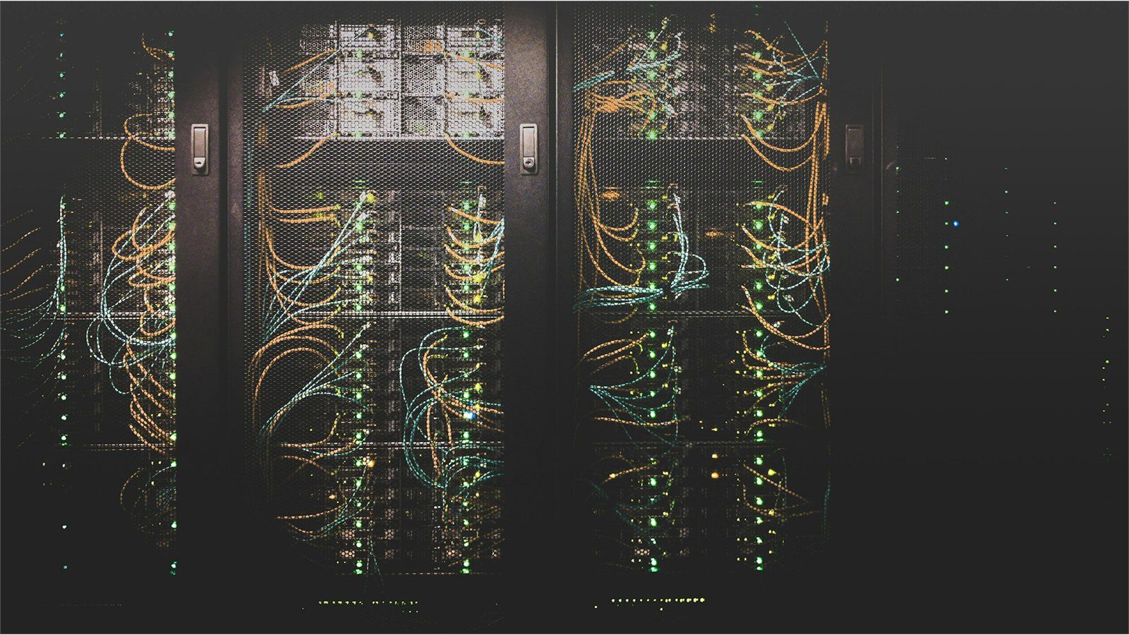 5 Cybersecurity Mistakes That Could Cost Your Small Business Everything 13 Server room with network cables representing cybersecurity mistakes from neglecting data backups and recovery testing