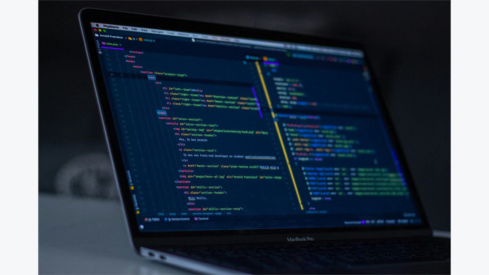 5 Cybersecurity Mistakes That Could Cost Your Small Business Everything 10 Colorful code on screen illustrating cybersecurity mistakes caused by weak passwords and missing multi-factor authentication