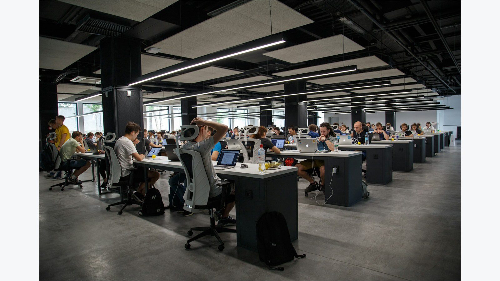 5 Cybersecurity Mistakes That Could Cost Your Small Business Everything 12 Team working at office desks highlighting cybersecurity mistakes caused by skipping employee security awareness training