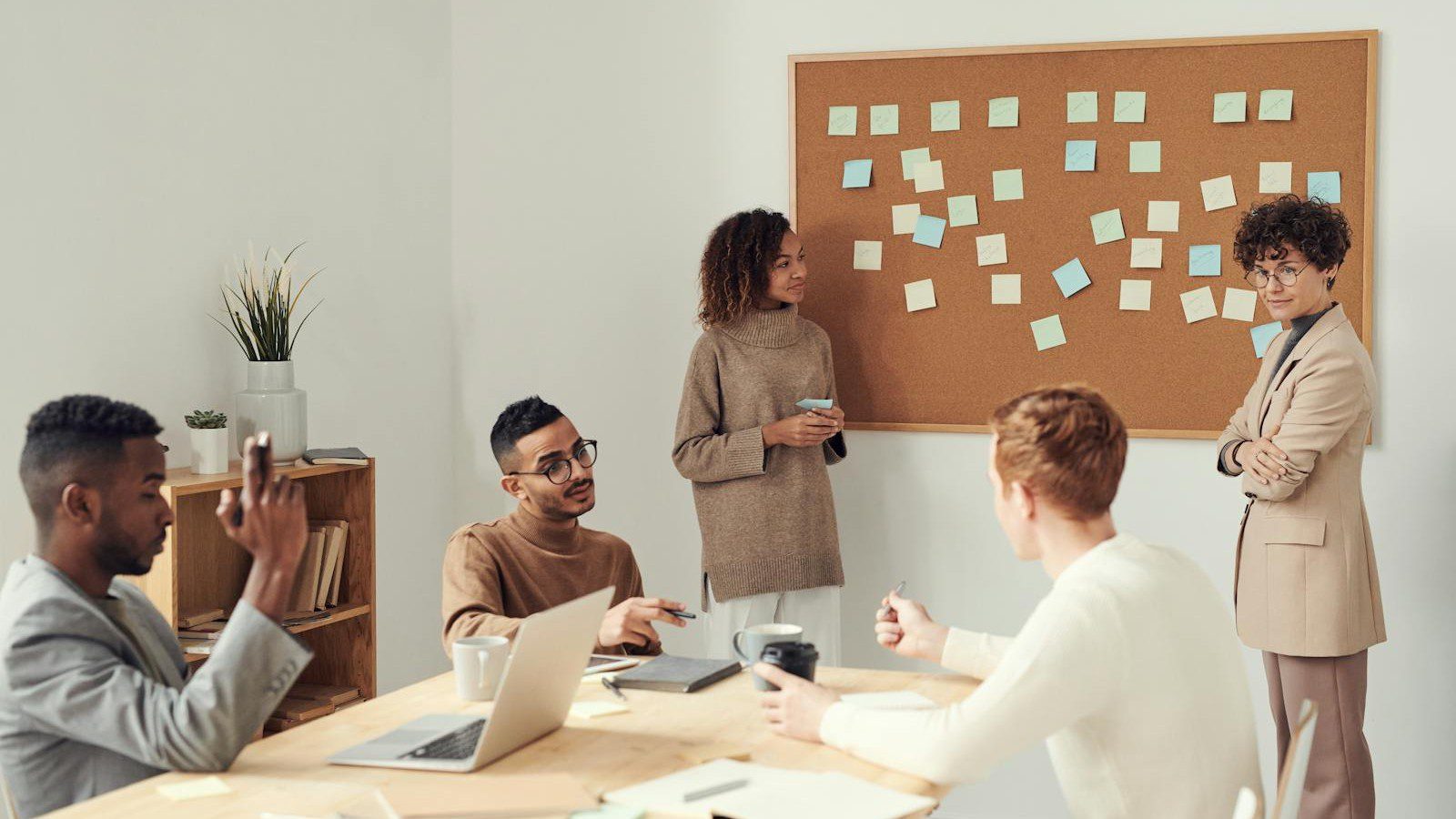 Digital transformation roadmaps: a leadership team planning a modernization strategy in a meeting