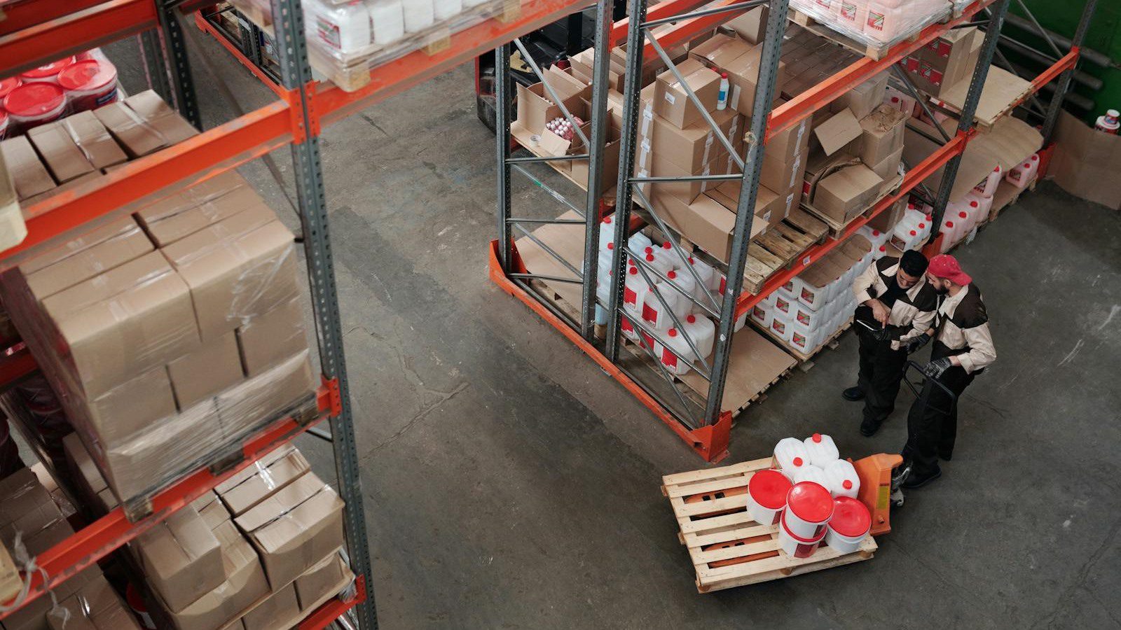 DLT Supply Chain Tracking: 7 Secure Wins Beyond Crypto 18 warehouse workers managing inventory shelves representing a secure tracking rollout roadmap