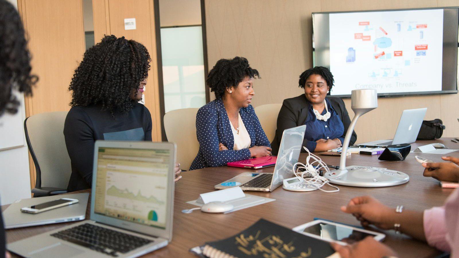 Google Workspace vs Microsoft 365: A Practical Buyer's Guide for Teams 8 Google Workspace vs Microsoft 365: a team meeting that relies on chat and video tools.