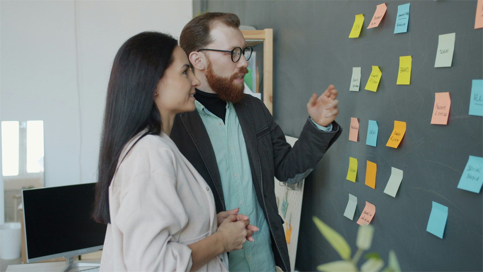 High-Availability Architecture: 9 Proven Uptime Wins 14 product team planning uptime goals and business-critical flows with sticky notes on a strategy board