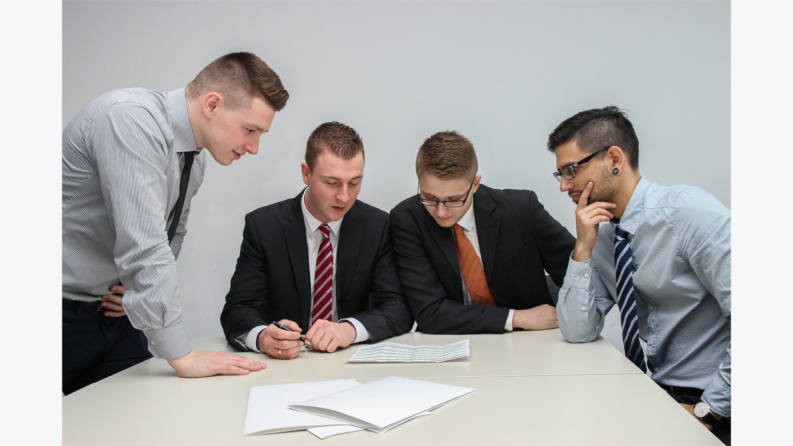 HR and Payroll Automation: 9 Powerful Secure Portal Wins 14 HR team reviewing workflow documents before automating payroll and employee portal requests