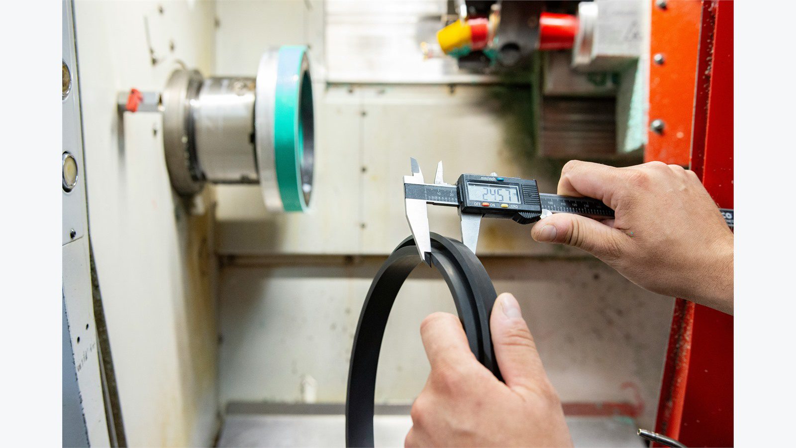 IoT Sensors for Predictive Maintenance: 9 Powerful Wins 14 technician measuring a critical industrial machine to prioritize downtime risk