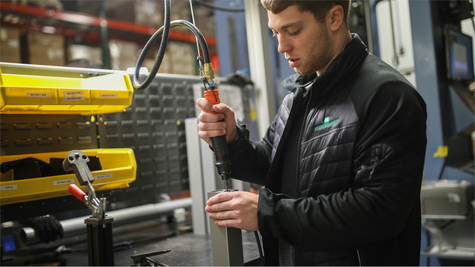 IoT Sensors for Predictive Maintenance: 9 Powerful Wins 20 industrial technician inspecting equipment connections for secure device and network operations