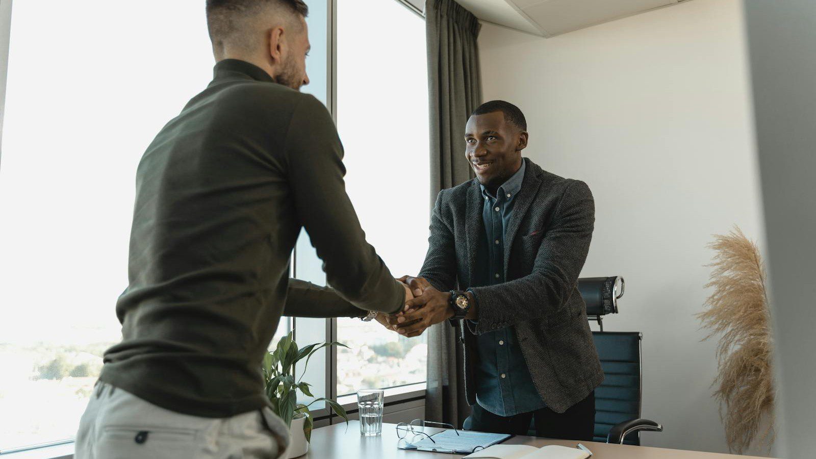 IT Case Studies: Real Problems, Smart Solutions, and Measurable ROI 7 IT case studies: a handshake representing the trust a strong case study builds.