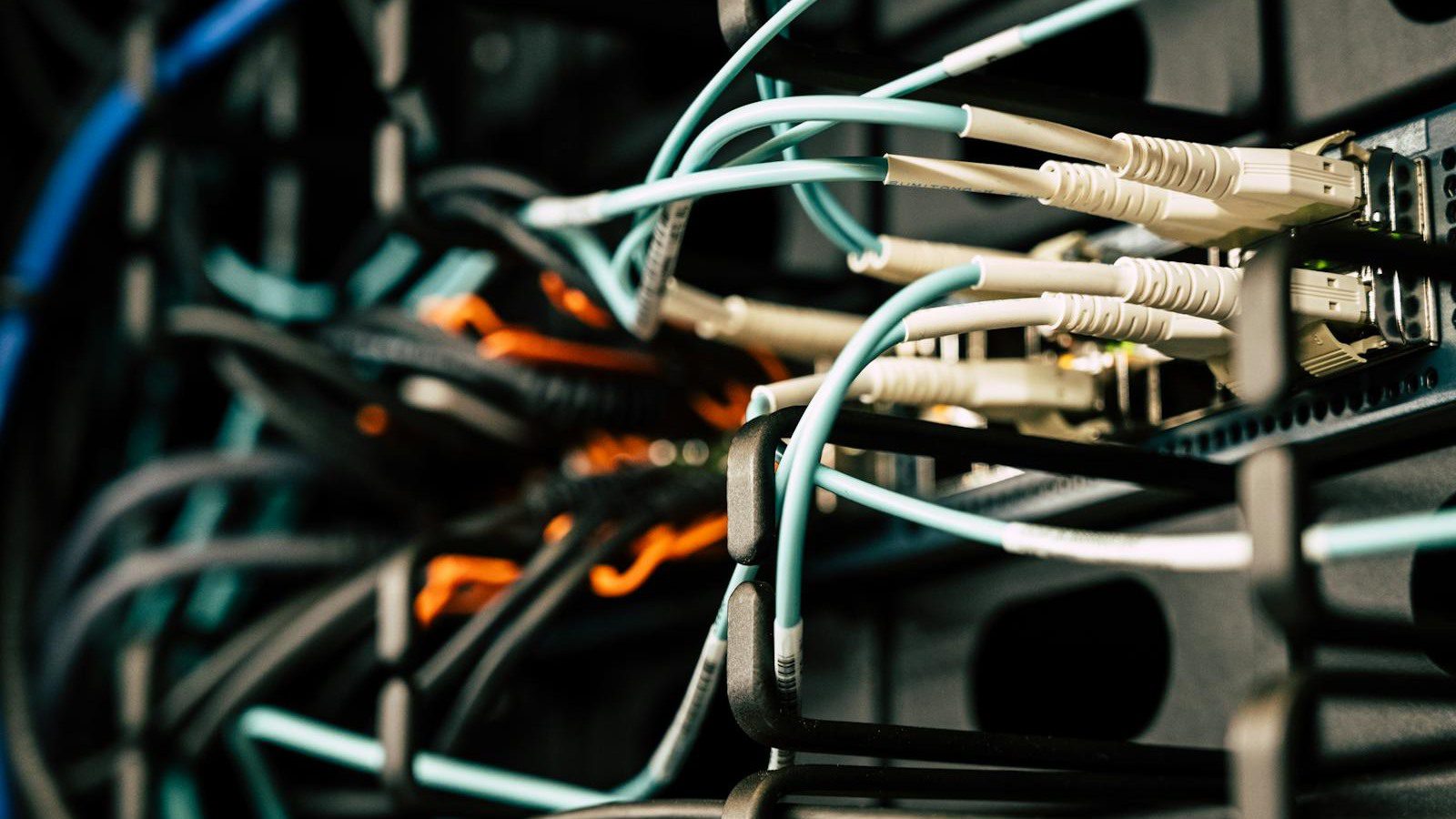 IT Spending Case Study: 7 Proven Ways We Cut Costs 30% 12 tangled server cables representing unclear technology ownership and hidden IT cost growth