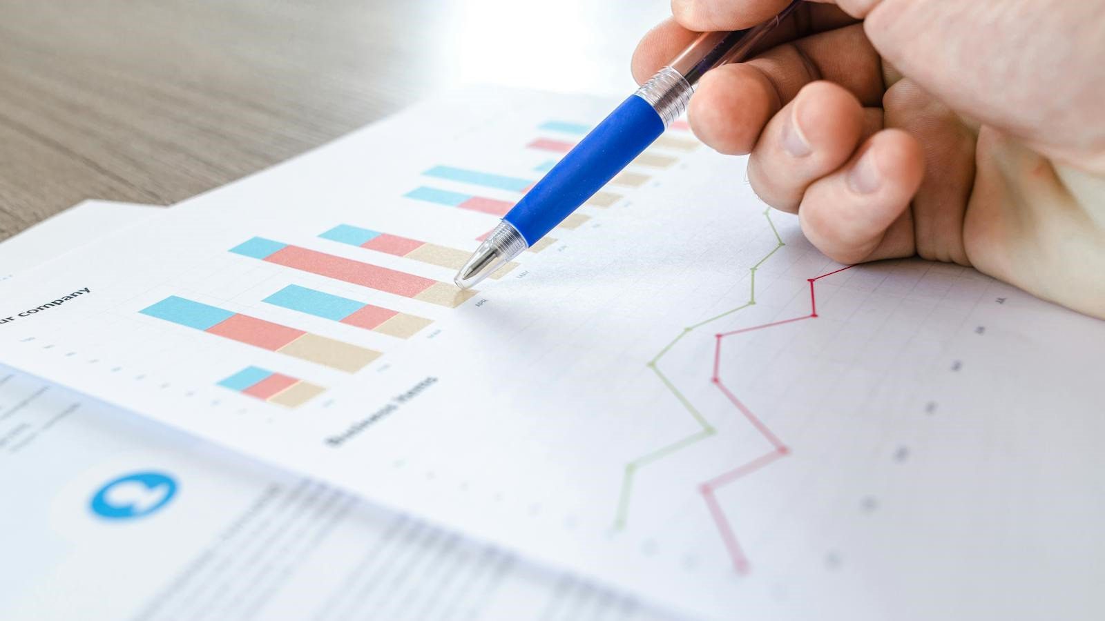 paper charts and manual analysis representing spreadsheet workarounds and rework costs