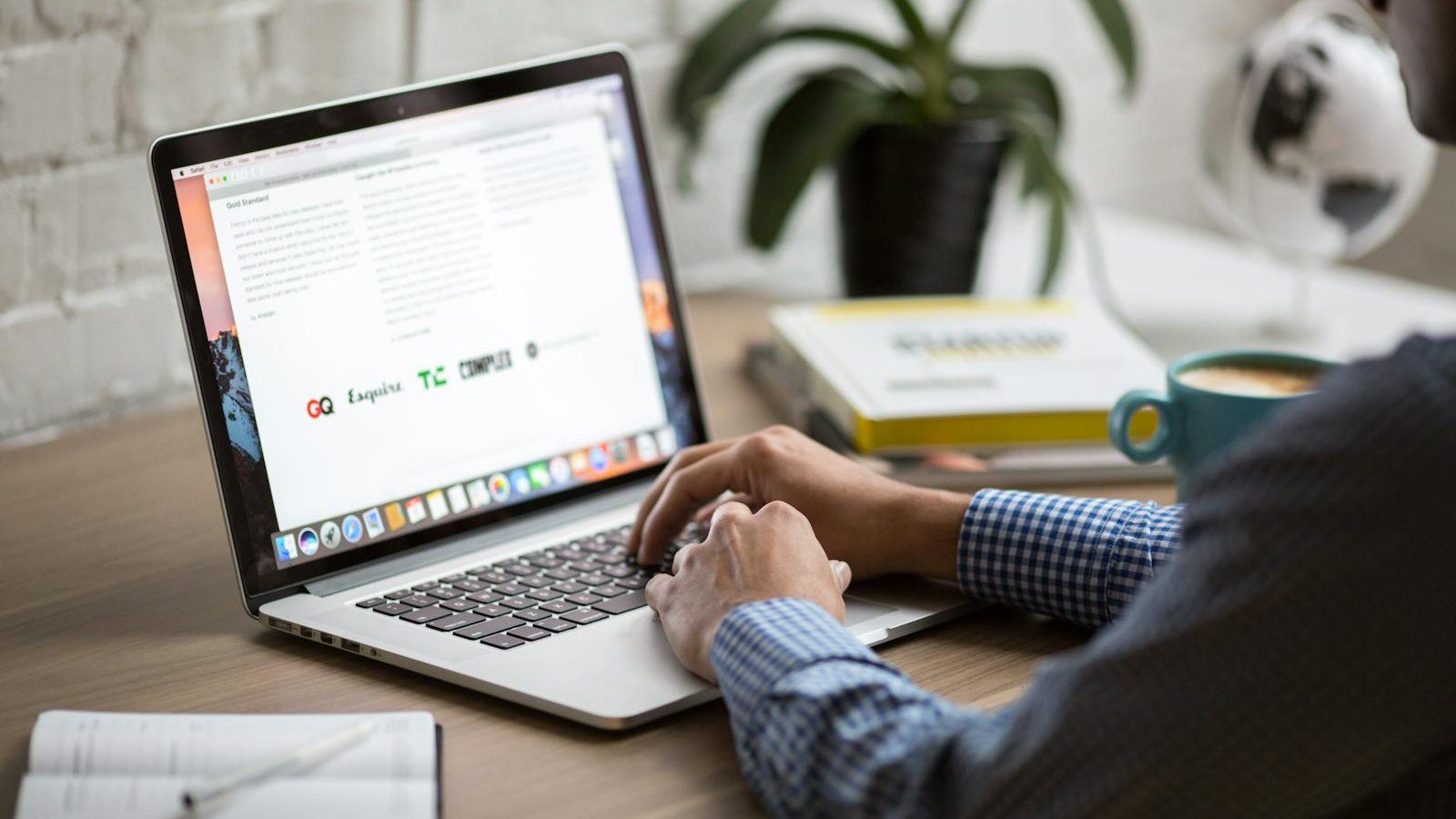 employee laptop workflow representing waiting time caused by slow business systems