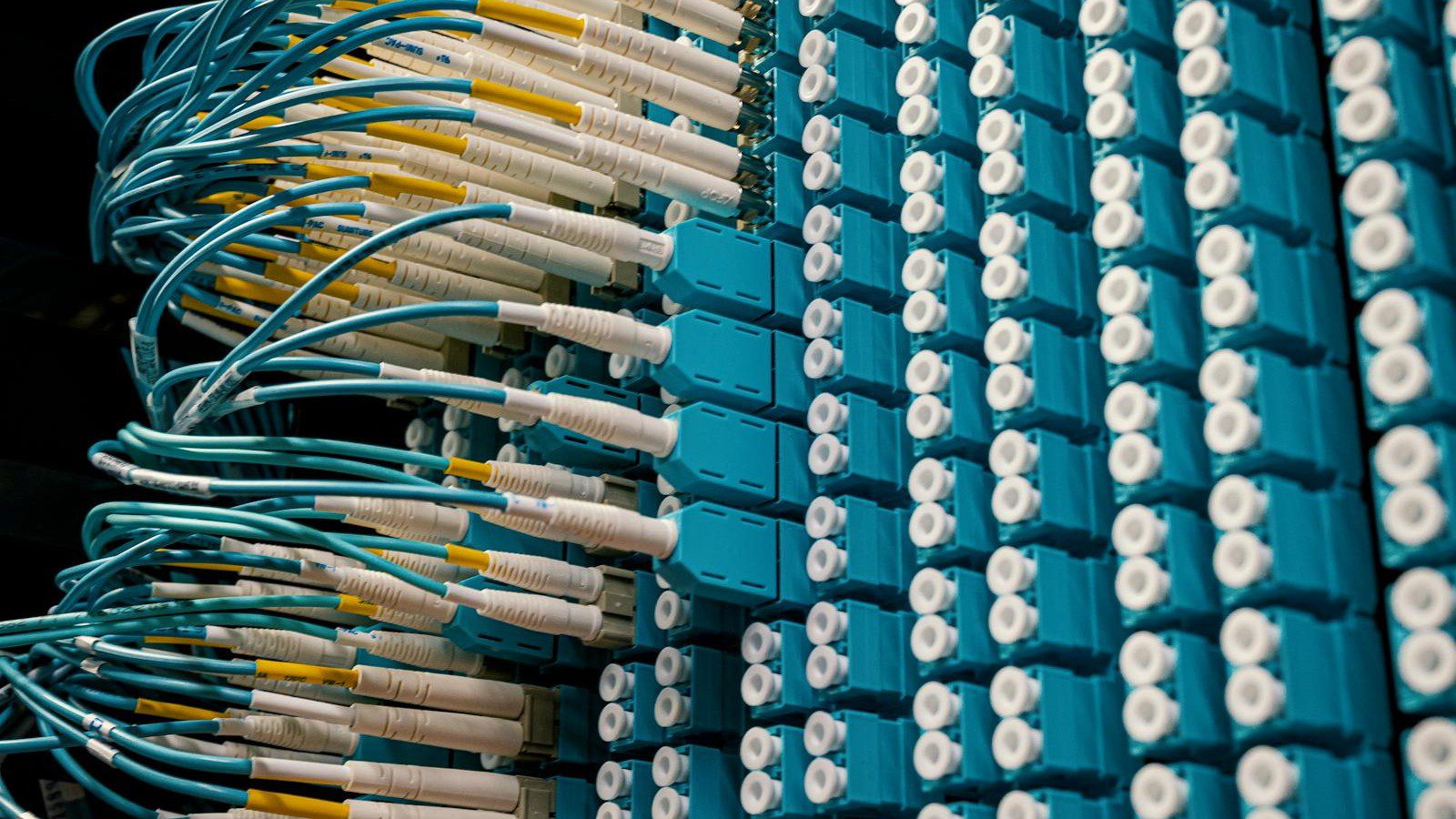 optimizing context window attention mechanism latency enterprise: fiber optic infrastructure supporting long-context LLM inference workloads