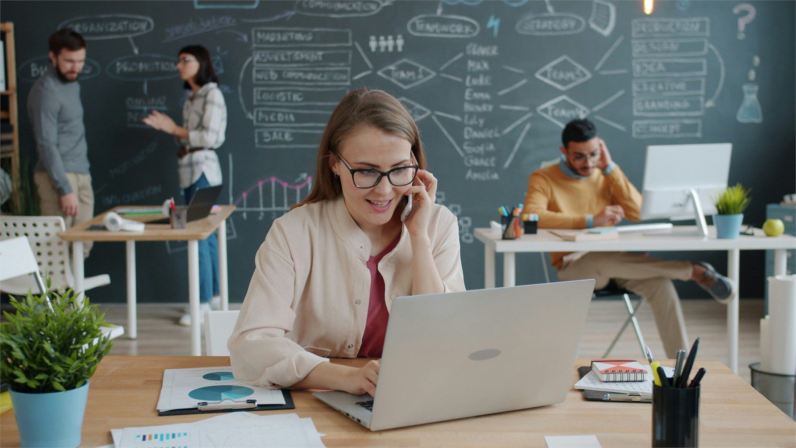 managed IT savings overview with business professionals working in a modern office environment