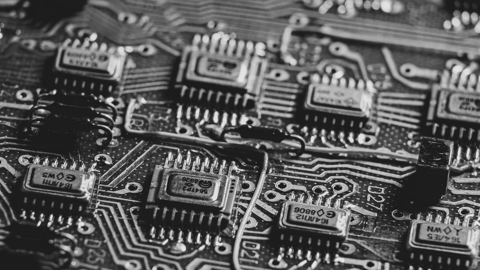 neuromorphic chips vs GPUs energy efficiency machine learning: detailed microchip on a circuit board for neuromorphic computing analysis