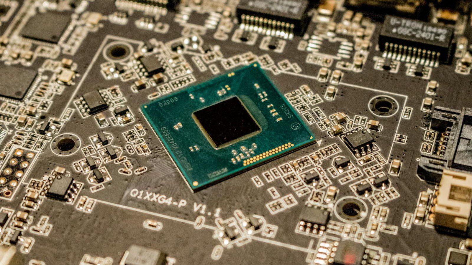 neuromorphic chips vs GPUs enterprise computing: detailed microchip on a circuit board for neuromorphic computing analysis