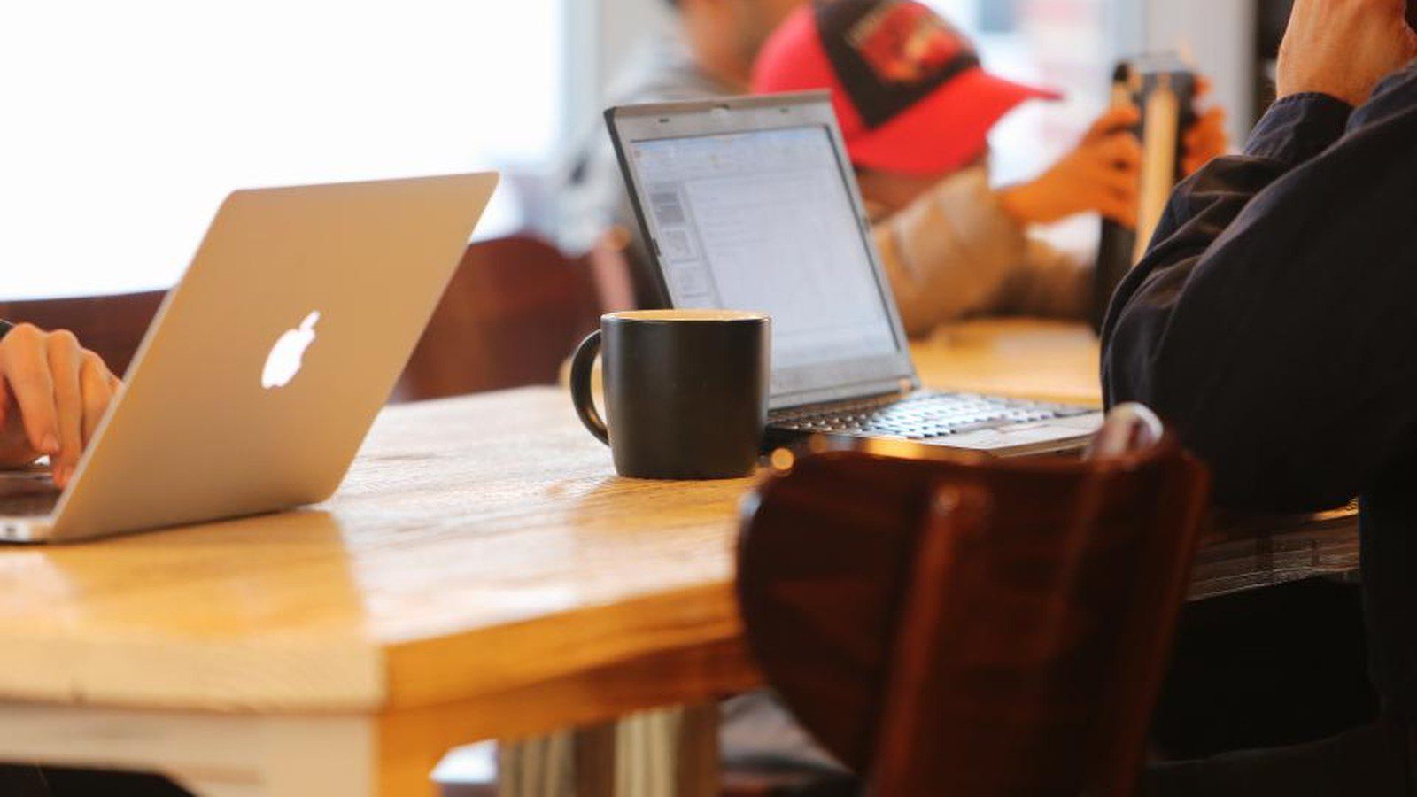 Platform Engineering vs DevOps: team laptops representing an internal developer platform workshop