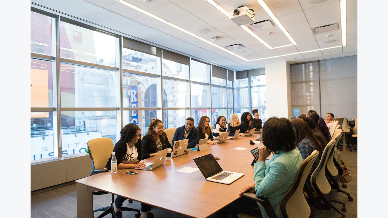 boardroom meeting for a 90 day rollout roadmap for distributed property management operators