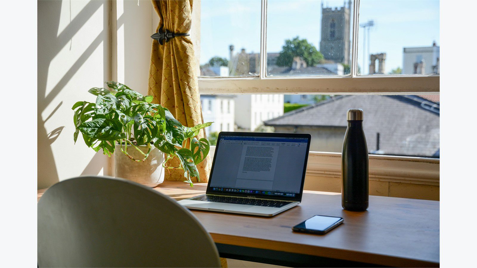 Remote Worker Laptops: 9 Easy Ways to Secure Them 20 laptop on a work table representing secure file backups and remote wipe readiness